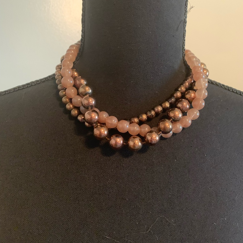 Triple strand beaded necklace